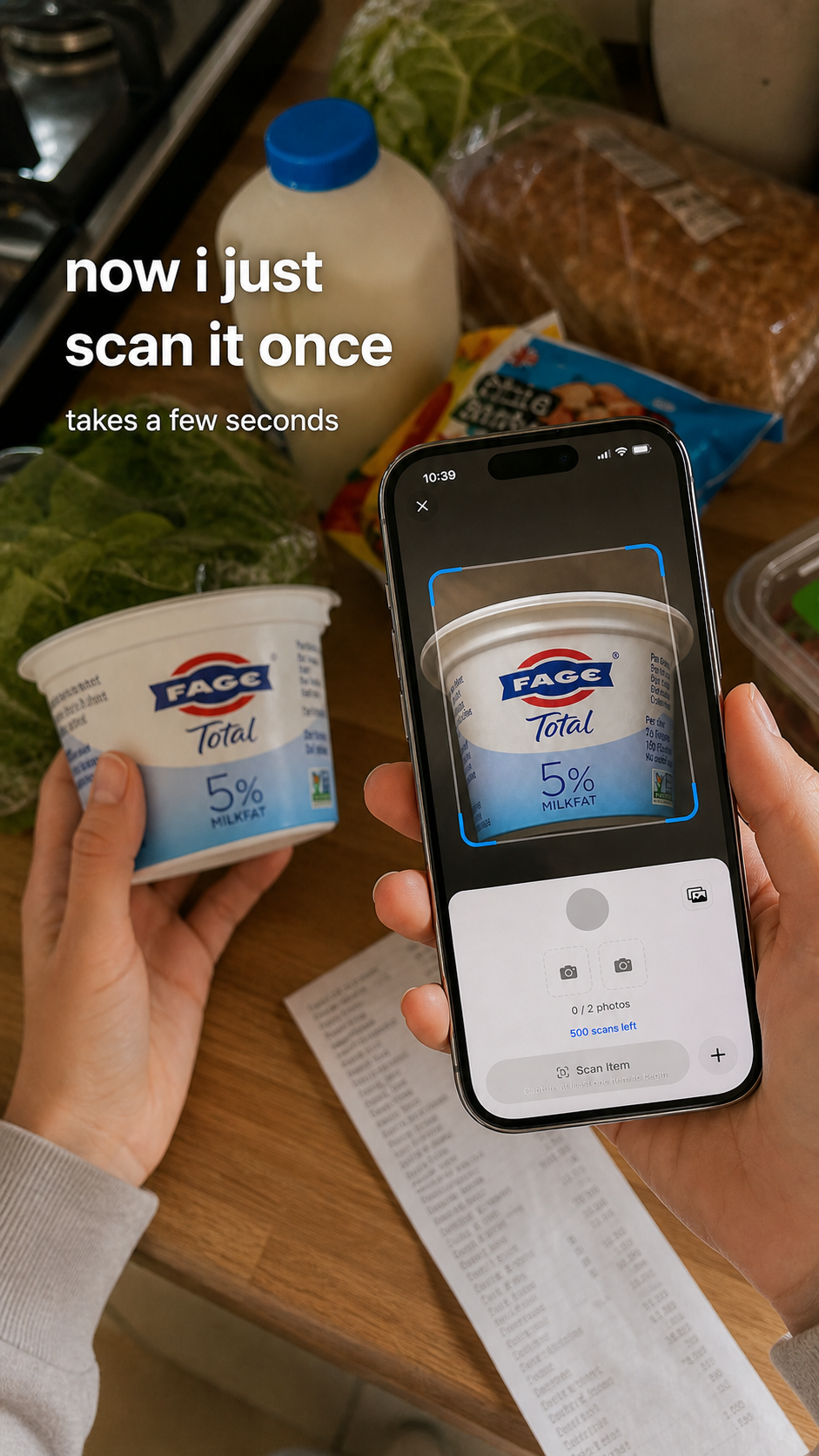 A person scanning a yogurt container with MODUS while groceries sit on the kitchen counter.